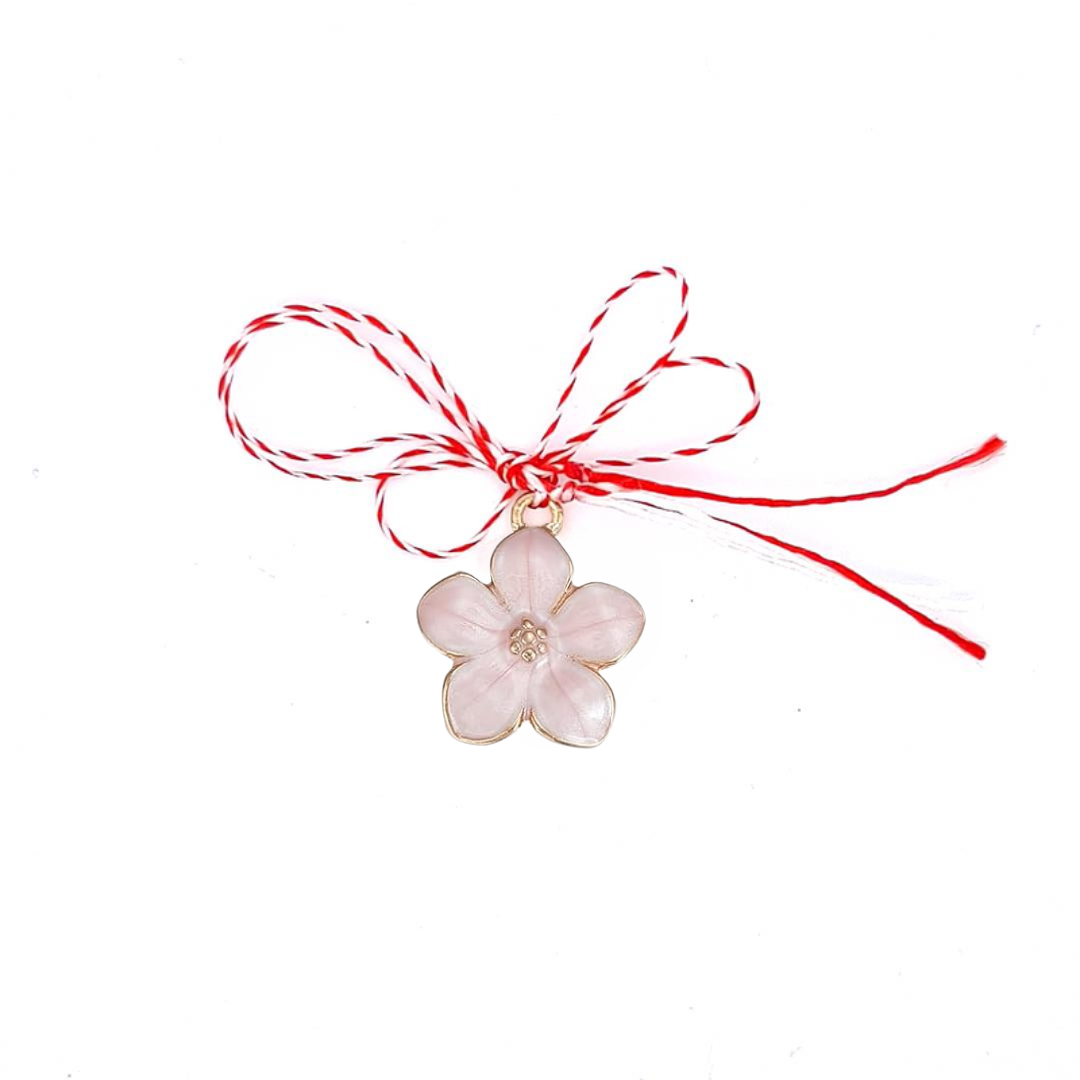 herry Blossom Martisor Charm Pendant featuring soft pink enamelled blossoms with golden accents, ideal for welcoming spring.