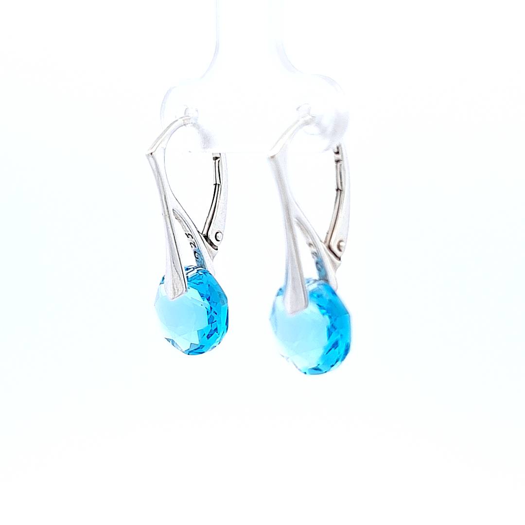 Side view of the Petite Dreaming Pretties Silver Dangle and Drop Earrings in Sterling Silver with Aquamarine Stones