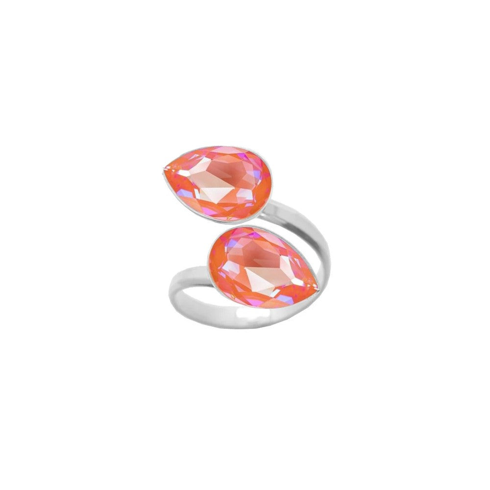 A striking dual crystal ring for women, crafted from 925 Sterling silver with Orange Glow Delite pear-cut crystals, wrapped elegantly around the finger, handmade by Magpie Gems in Ireland.