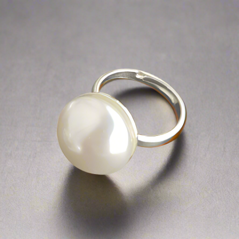 Elegant pearl ring made in Ireland, featuring nickel-free sterling silver and an oversized crystal pearl, handcrafted by Magpie Gems.