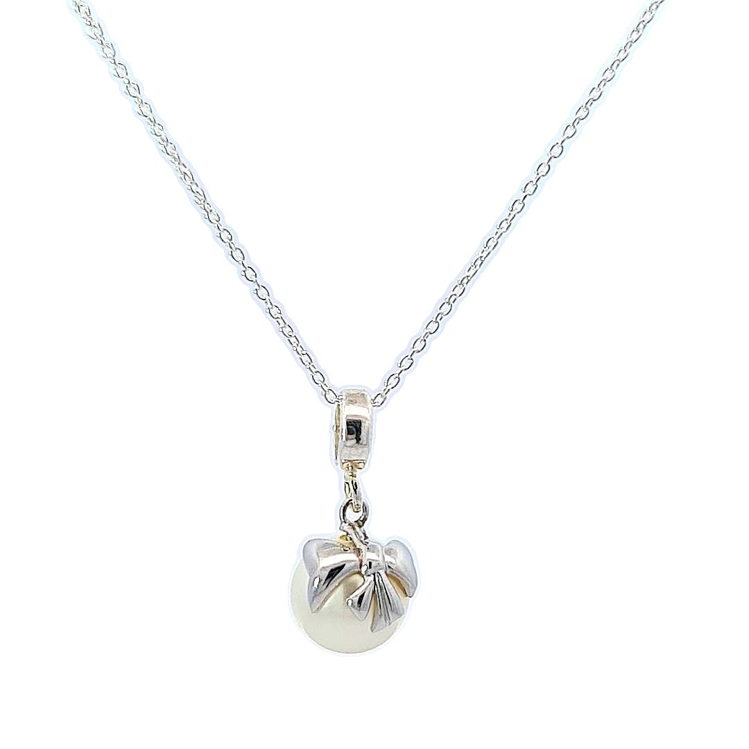 Magpie Gems' Bow Embraced Pearl Drop Necklace in Sterling Silver with Austrian Crystal Pearl