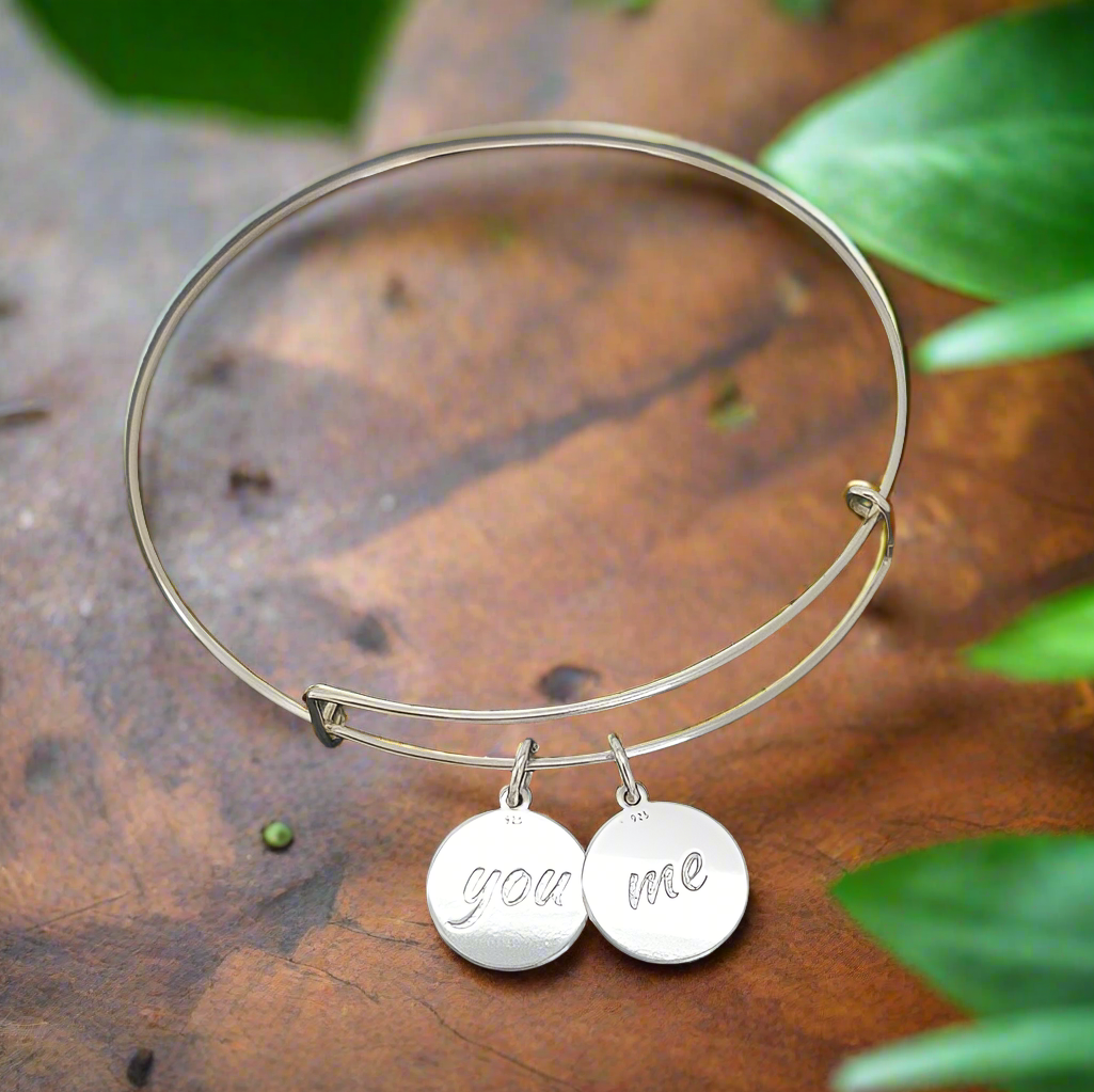 Handcrafted Sterling Silver Bangle Bracelet Featuring Two Dangly Discs Engraved with "You" and "Me"