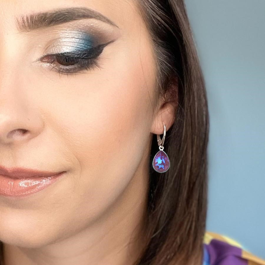 Woman wearing Sterling Silver Teardrop Earrings with Burgundy DeLite Pear-Cut Crystals from Austria, made by Magpie Gems in Ireland