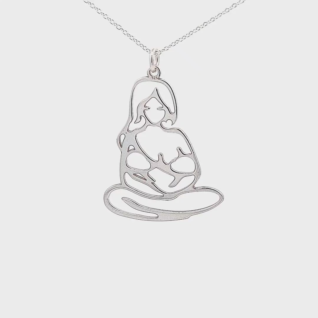 Video showcasing the charming motherhood necklace in Sterling silver, a design of a woman holding 2 babies while breastfeeding her twins