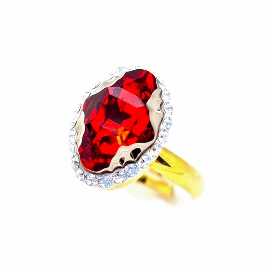 Close-up of Red Oval Tribe Crystal Ring with Moonlight Crystal Halo in gold, handmade in Ireland