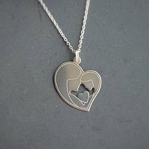Close-up of Silver Mother and Daughter Heart Pendant Necklace