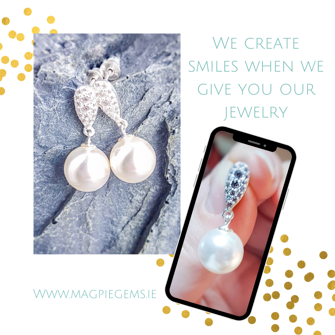 Elegant Pearl Drop Earring in Sterling Silver featuring a 12mm white pearl and Austrian crystal teardrop design. Shop Local in Cork Ireland