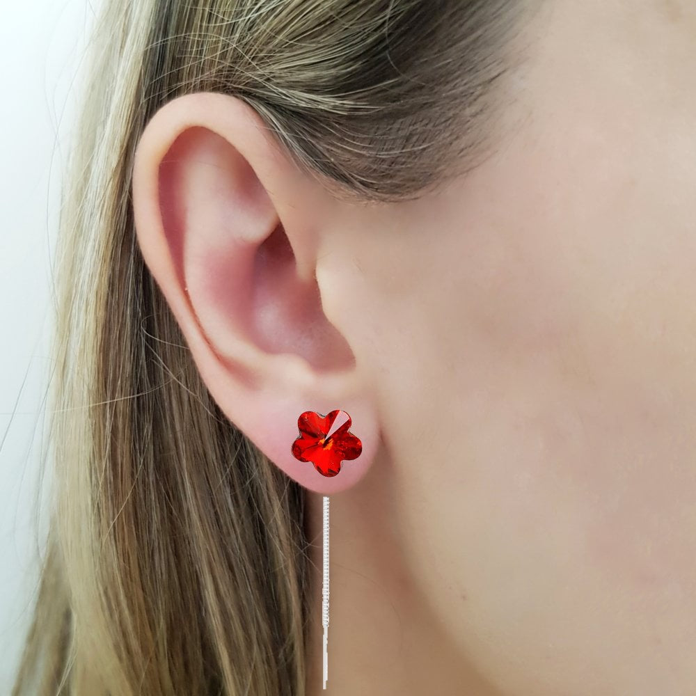 Model Wearing Flower Crystal Silver Threader Earrings in Siam Red, made by Magpie Gems in Ireland
