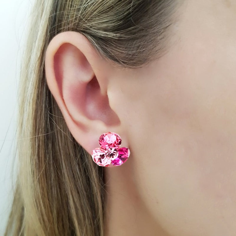 Model wearing Rose Fuchsia Pink Silver Stud Earrings to demonstrate fit and style